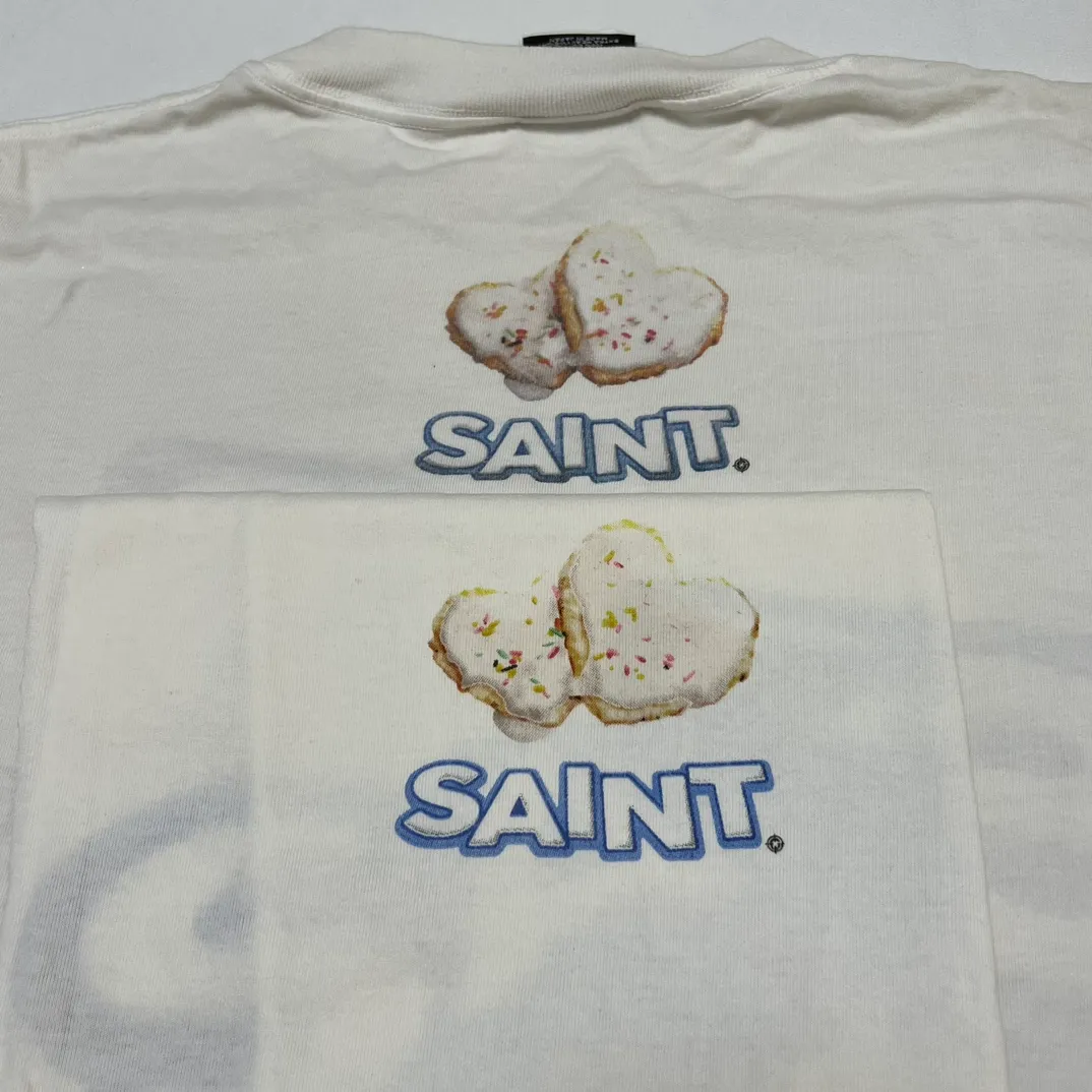 Printing proofing SAINT Mxxxxxx HEART COOKIES L/S TEE/WHT Love Oreo printed long sleeves Off-white S-XL Customized co-branded main mark/wash mark Correct version Ready-made garments washed and distressed Full of VINTAGE feeling Top-notch printing technology Perfect restoration
